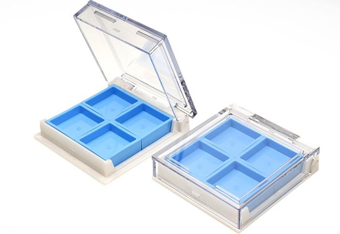 Eyeshadow compact with replaceable color bricks